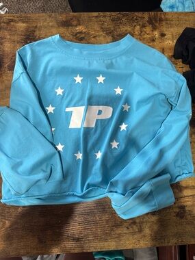 Light Blue Crop Sweatshirt with White Star Logo